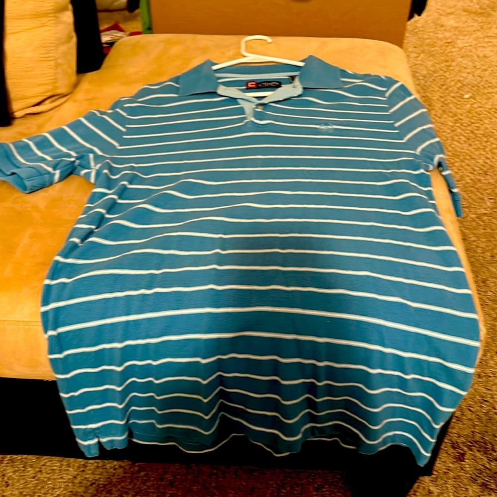 S/P/CH CHAPS POLO SHIRT. Sky Blue stripes w/ white stripes. Slightly worn.